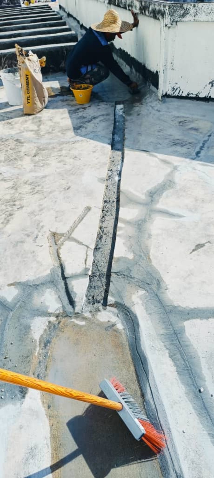 Waterproofing repair along roof drainage channel and wall junction